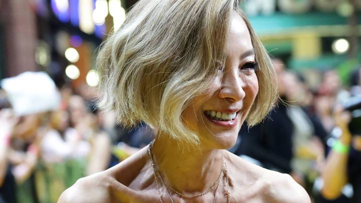 Michelle Yeoh, 63, reveals toned figure in plunging neckline and see-through bubble dress for Wicked event