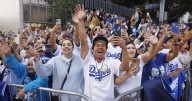 Commentary: From far away, an L.A. couple grapples with all-too-familiar debate after Dodgers win