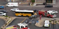 Rescues underway after crash involving school bus in north Phoenix