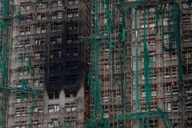 Death toll rises to 128 in Hong Kong residential fire; 8 more arrested over towers’ renovation