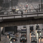 Atmospheric river hits Southern California with risks of flash floods in fire