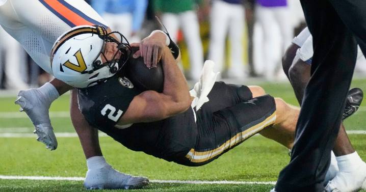 The Latest: 19 teams in the AP Top 25 take new spots