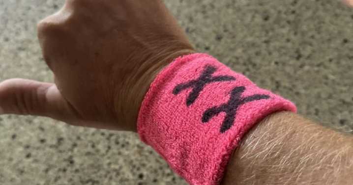 Judge hears appeal arguments in pink XX wristband case
