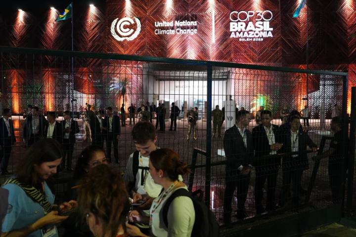 Protesters confront security at main venue of UN climate talks