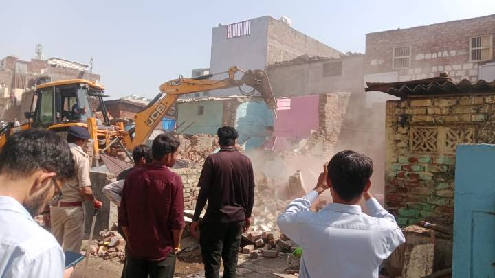 AMC conducts demolition drive in Satellite to remove illegal encroachments