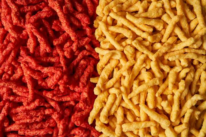 Doritos and Cheetos dial back the bright orange in new versions without artificial ingredients