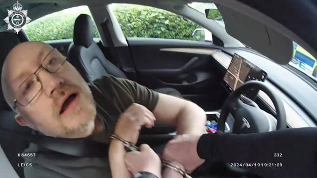 Moment NHS paedophile who tied up and raped girl at hotel snared by police at KFC drive