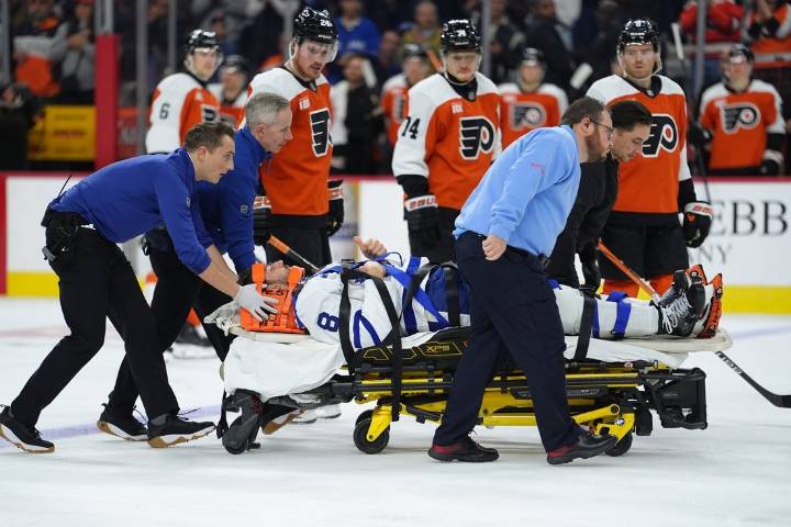 Deadspin | Maple Leafs D Chris Tanev exits by stretcher during win over Flyers
