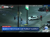 Driver speeds on surface streets, nearly collides with cars during chase in the San Fernando Valley