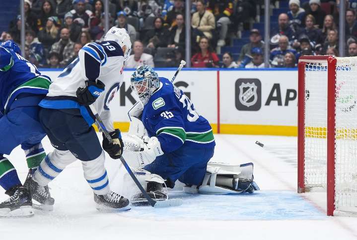 Morrissey’s three points power Winnipeg Jets to 5-3 victory over Vancouver Canucks