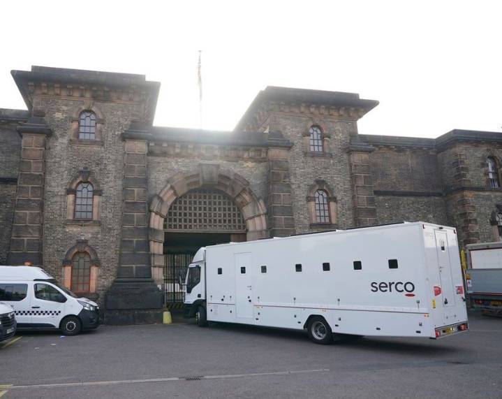 One of two mistakenly released UK prisoners surrenders