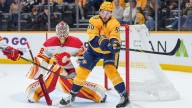 Bunting gets 3 points in 1st, Predators hold off Flames to end skid at 3