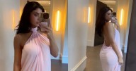 Kylie Jenner’s Backless Dress in KHY Video Is as Flirty as It Gets