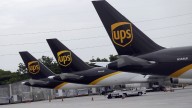 Some UPS and FedEx planes are grounded. What does that mean for holiday shipping?