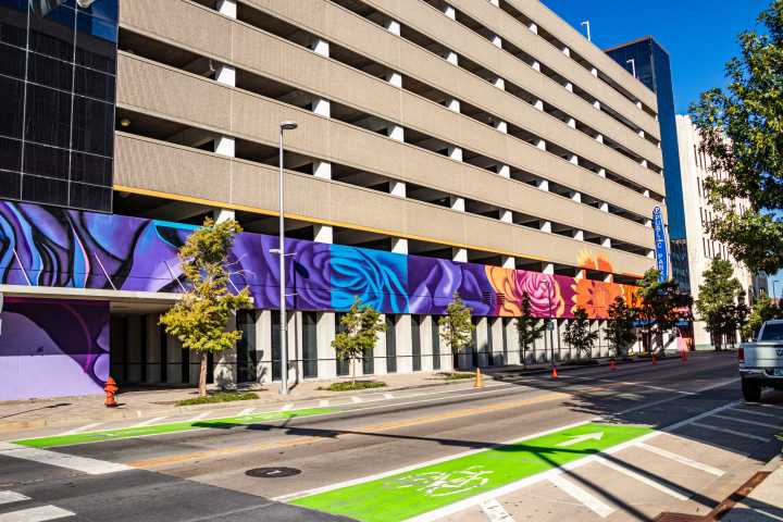 Denver artist completes large-scale mural at Embark garage