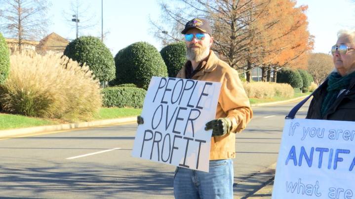 'We think it matters' Protesters urge Black Friday shoppers to support local businesses