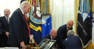 Man collapses behind Donald Trump during White House announcement