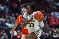 Holloway and Delfosse lead No. 6 Michigan over Detroit Mercy 102