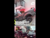 2 injured after high-speed crash leaves truck in building