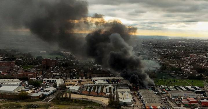 Huge blaze rips through warehouse as 150 firefighters tackle blaze