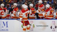 Flames crush Sabres in battle of last