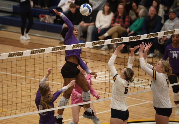 Photos of Bloomfield Hills vs. Oxford in a D1 volleyball quarterfinal at St. Clair County Community College