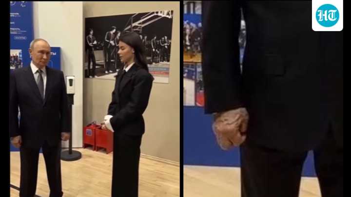 Vladimir Putin's 'swollen and sore' hand at public event sparks health rumours