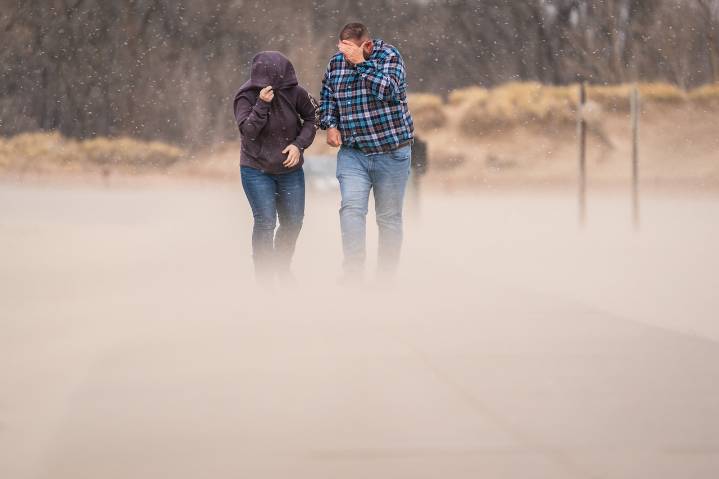 High winds, large waves draw people to the Lake Michigan shore during storm