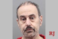 Henderson man accused of throwing dog in trash says coyote attacked animal