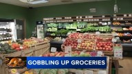 Shoppers buy Thanksgiving feasts ahead of the holiday in Springfield, Pa.