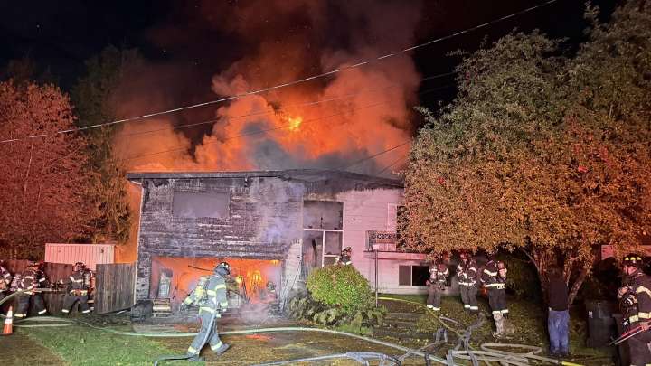 Crews battle early morning house fire in Kent