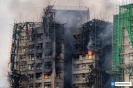 Suben a 128 muertos y 200 desaparecidos tras megaincendio en Hong Kong: 11 personas han sido detenidas