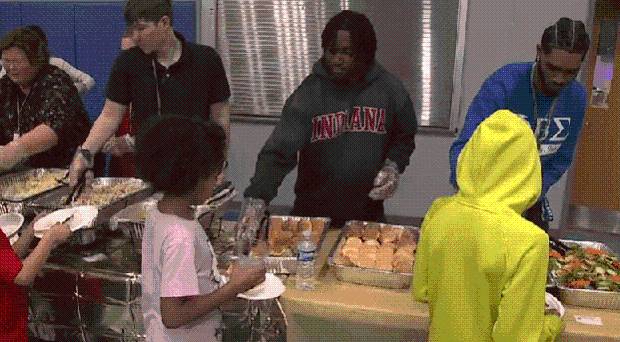 IU football player hands out turkeys, hope for the holidays