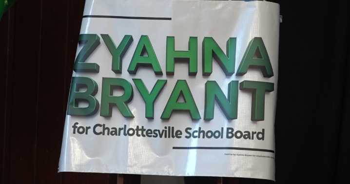 Harris congratulates CCSB member Bryant