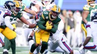 Josh Jacobs ruled out with knee injury as Packers take 19