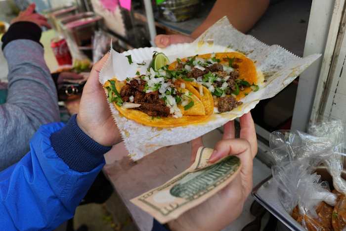 'A day without fear': Chicagoans buy out street vendors amid immigration crackdown