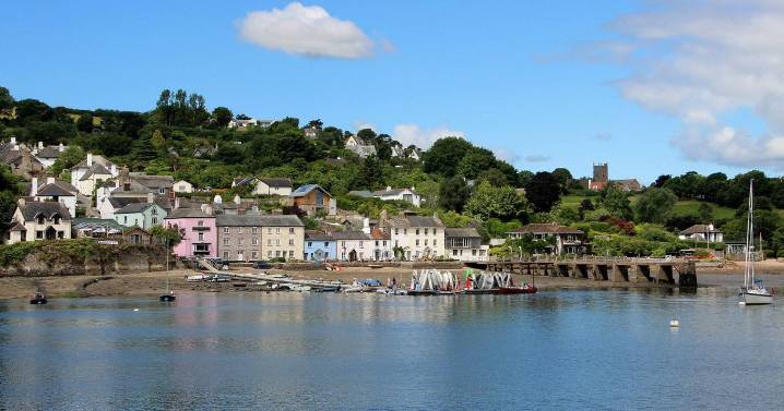 Horror as body found inside charred caravan after fire at Devon landfill as cops probe