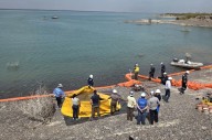 Hicieron un ensayo de protección de derrames en el Lago Casa de Piedra