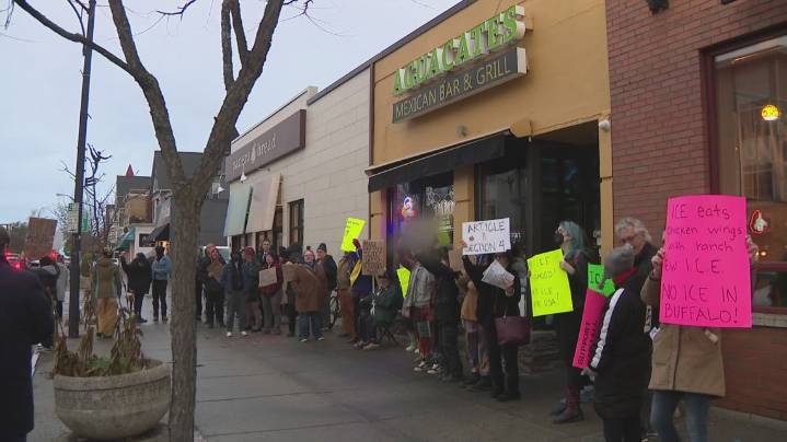 Anti-ICE rally held in Elmwood Village after apparent enforcement action on Thursday