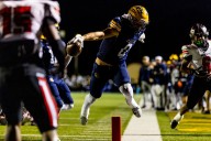 PHOTOS: Grand Blanc, Clarkston face off in juggernaut D1 district championship