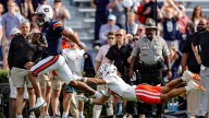 Knight totals 401 yards, six TDs as Auburn rolls past Mercer 62