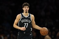 Nets' Ben Saraf out at least 10 days with ankle sprain after G League setback