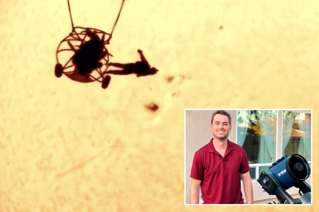 Astrophotographer captures skydiver silhouetted against sun