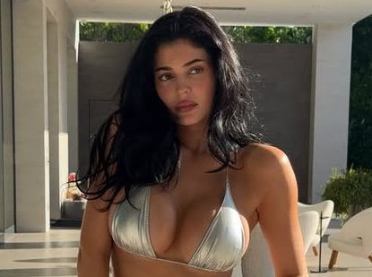 Kylie Jenner wows in shiny bikini and shower selfie