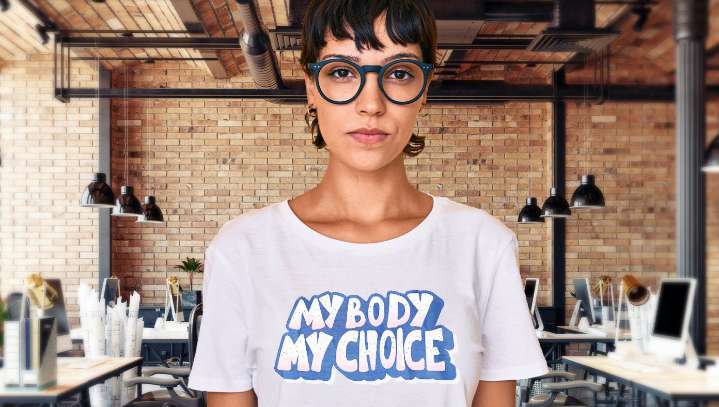 'Vaccines Should Be Mandatory,' Says Woman Wearing My Body, My Choice T