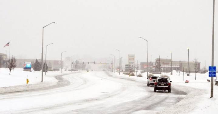 Crews restoring power in Wisconsin while Iowa airport reopens after plane left icy runway