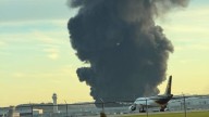Huge fire after plane crashes near airport in Kentucky, injuries reported