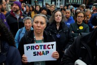 SNAP benefits will be partially funded as shutdown stretches on, White House says