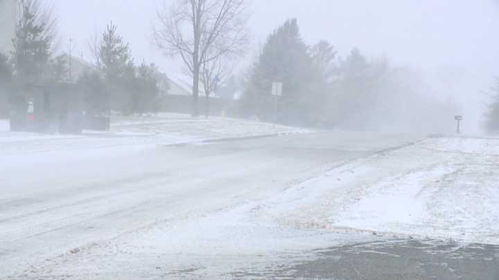 Drivers push through slick roads and strong winds ahead of Thanksgiving