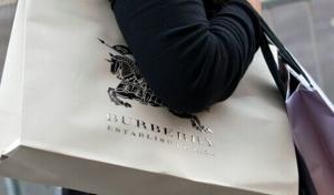 Burberry narrows first half loss on turnaround plan